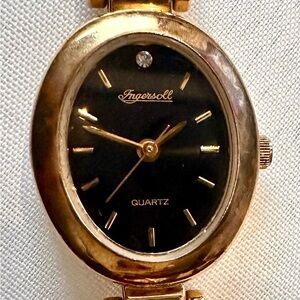 Classic Ingersoll Gold Oval Watch with Black Dial